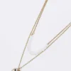 Double Strand Coin Pendant Necklace In Gold