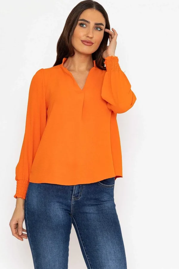 Long Sleeve Collarless Top In Orange